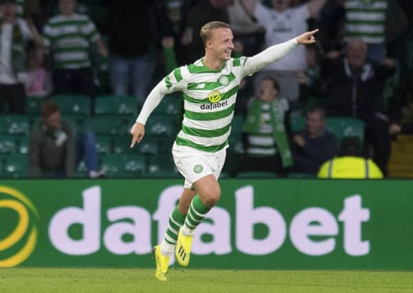 Leigh Griffiths celebrates scoring the opener, and his 100th Celtic goal. Picture: SNS Group