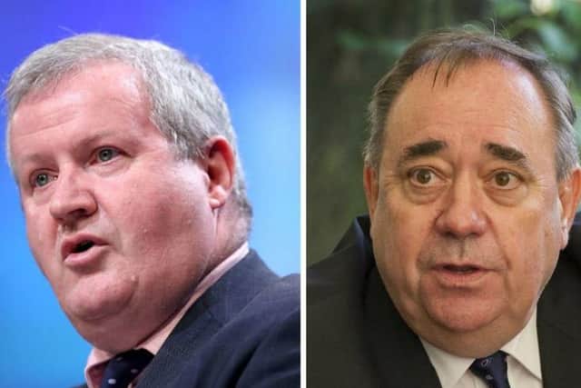 SNP's Westminster leader Ian Blackford (L) said the party is "pretty united" after Alex Salmond's (R) resignation. Picture: TSPL