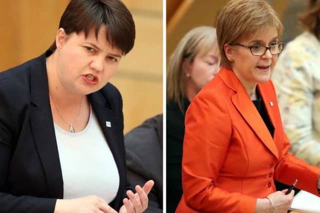 Ruth Davidson (L) has urged Nicola Sturgeon (R) to rule out holding a second Scottish independence referendum. Picture: PA Wire