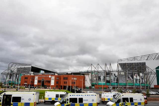 Five fans were injured in a crush at Celtic Park.
