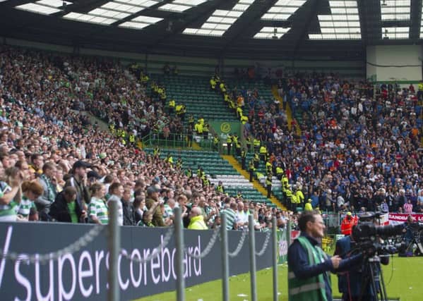 Celtic and Rangers fans at Parkhead on Sunday. Picture: SNS