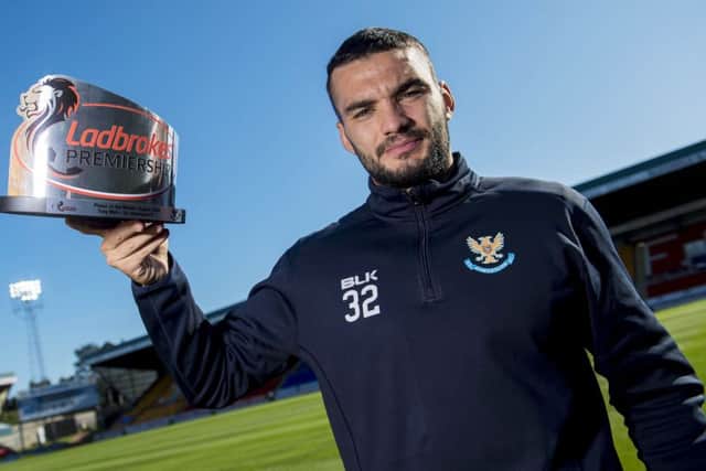 Tony Watt with the Ladbrokes Player of the Month Award for August. The striker is targeting a Scotland recall. Picture: SNS Group