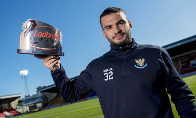 Tony Watt with the Ladbrokes Player of the Month Award for August. The striker is targeting a Scotland recall. Picture: SNS Group