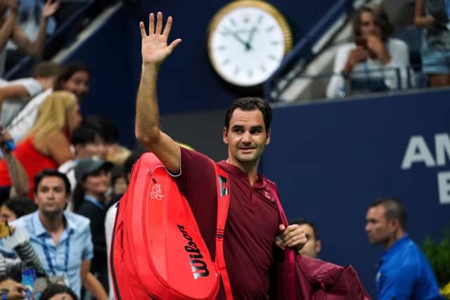 Roger Federer waves as he walks off court after losing to Australia's John Millman at the US Open. Picture: Eduardo Munoz Alvarez/AFP/Getty Images