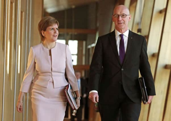 First Minister Nicola Sturgeon and Deputy First Minister John Swinney arrive at Holyrood ahead of the Scottish Government revealing its Programme for Government (PfG). Picture: PA