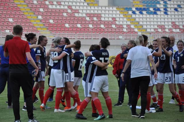 Scotland's players celebrate after the victory over Albania which sealed World Cup qualification. Picture: Scottish FA