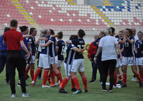 Scotland's players celebrate after the victory over Albania which sealed World Cup qualification. Picture: Scottish FA
