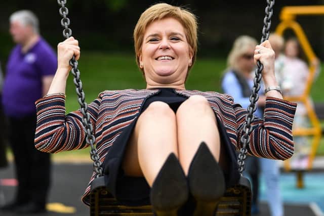 Nicola Sturgeon has fun on a swing, but her Programme for Government has failed to fire the imagination of the nation (Picture: Jeff J Mitchell/Getty Images)