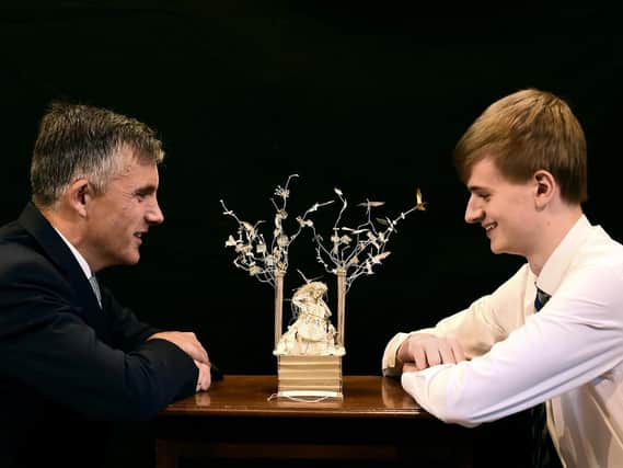 Edinburgh's new paper sculpture has unveiled at St Mary's Music School by headteacher Dr Kenneth Taylor and head boy Max Carsley.