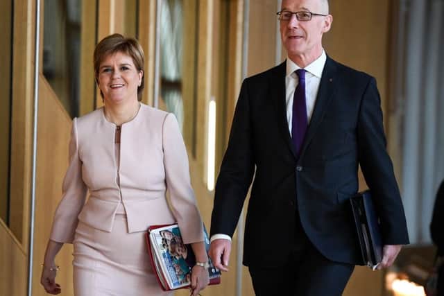 Nicola Sturgeon with John Swinney. (Photo by Jeff J Mitchell/Getty Images)
