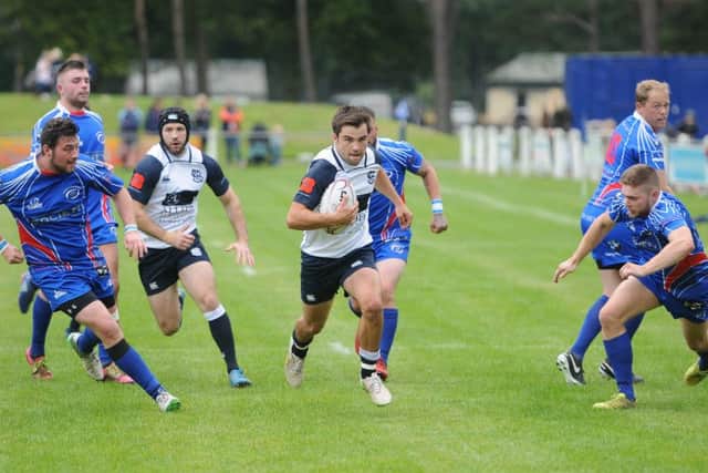 Aaron McColm scores his second try of the afternoon for Selkirk