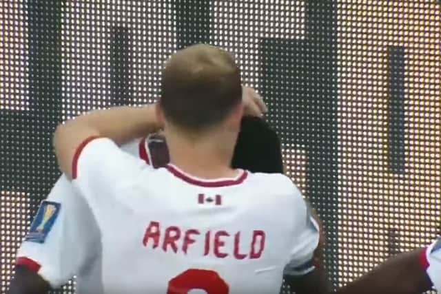 Arfield can be seen celebrating Alphonso Davies' goal for Canada in the advert. Picture: Contributed