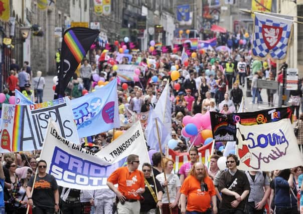 Pride marchers fill the Royal Mile in Edinburgh (Picture: Ian Georgeson)