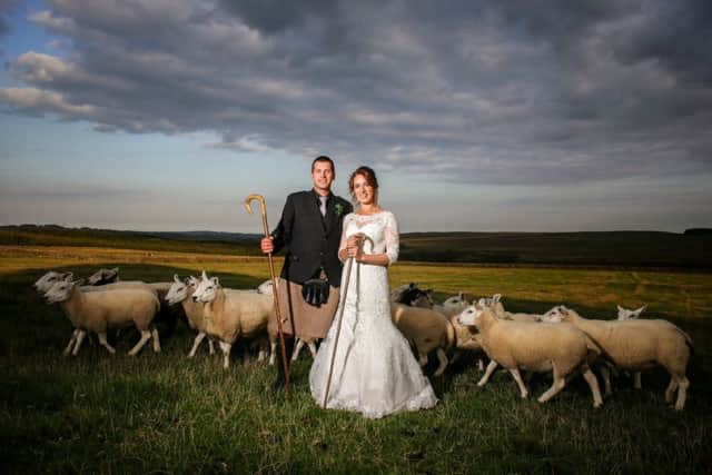 Shepherdess Emma Gray from Hawick in the Scottish Borders on her wedding day with new husband Ewan Irvine. Picture: SWNS