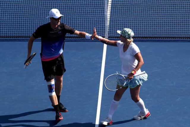Jamie Murray and Bethanie Mattek-Sands celebrate a point during their sem-final win. Picture: Al Bello