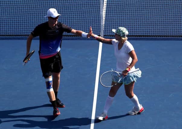 Jamie Murray and Bethanie Mattek-Sands celebrate a point during their sem-final win. Picture: Al Bello