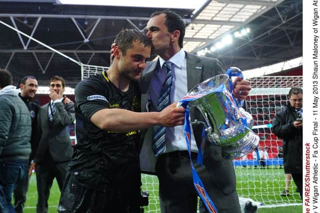Wigan manager Roberto Martinez with Shaun Maloney after beating Man City in the 2013 FA Cup final. Picture: The FA/REX/Shutterstock