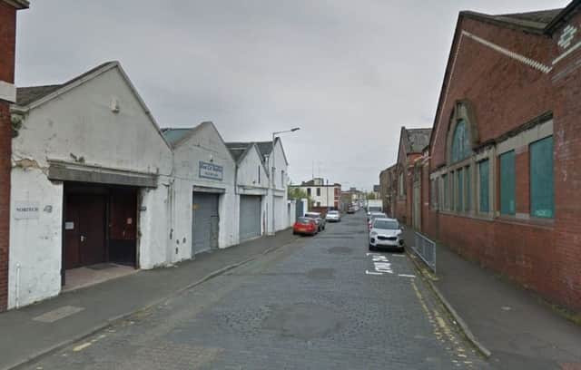 Officers sweooped on a building in Back Sneddon Street, Paisley, on Thursday morning. Picture: Google Maps
