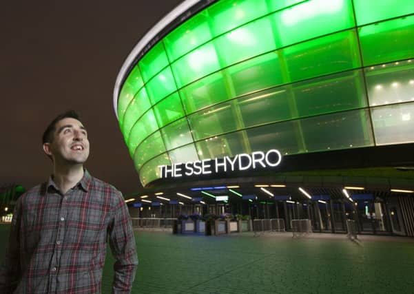 Face of the campaign...Scottish transplant recipient Gordon Hutchinson visited the illuminated SSE Hydro in a bid to encourage people across Scotland to join the NHS Organ Donor Register.