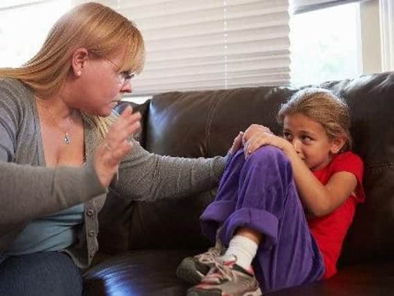 An enactment of a mother being physically abusive towards her daughter. Picture: Monkey Business Images/REX/Shutterstock