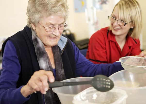 General stock photo of care worker with an elderly service user