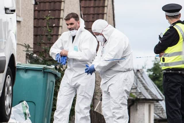 Forensics at the scene of the shooting. Picture: John Devlin