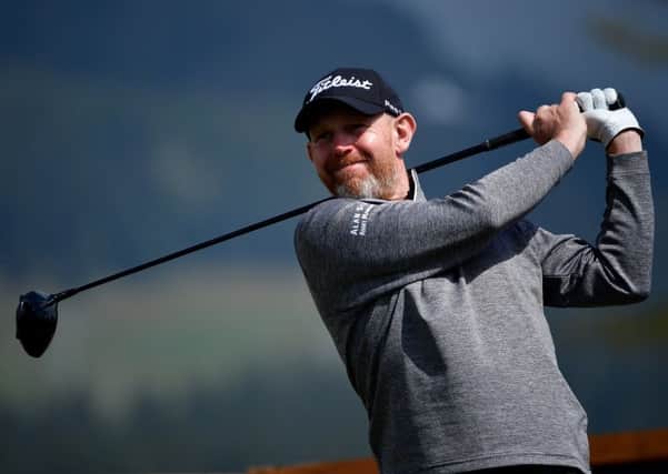 Stephen Gallacher drives during his second round in Switzerland. Picture: Stuart Franklin/Getty