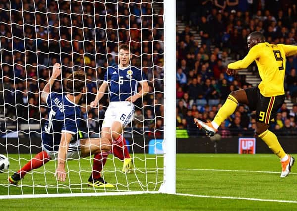 Romelu Lukaku nets Belgiums first goal after defensive blunders by Scotland. Picture: Ross MacDonald/SNS