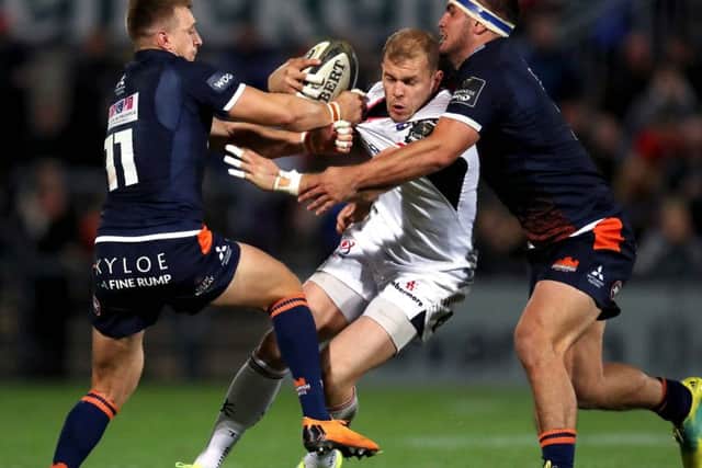 Ulster's Will Addison attempts to find a way past Tom Brown and Stuart McInally of Edinburgh. Picture: Bryan Keane/INPHO/REX/Shutterstock