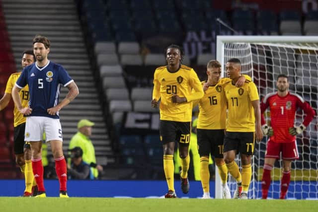 Scotland's Charlie Mulgrew stands dejected. Pic: SNS