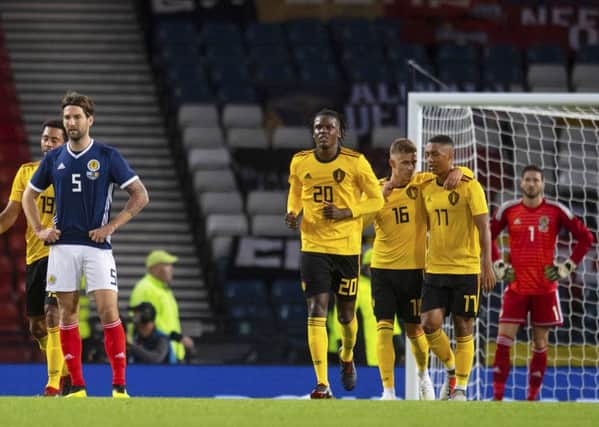 Scotland's Charlie Mulgrew stands dejected. Pic: SNS