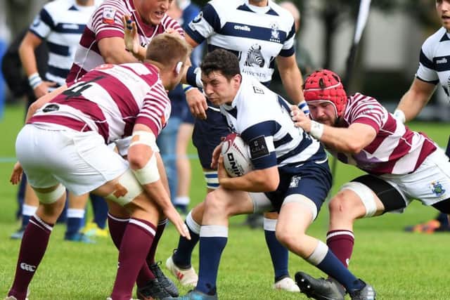 Heriots' Rory McMichael takes on Jamie Hodgson. Pic: SNS/SRU