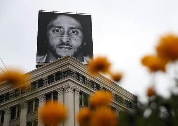 A billboard featuring Colin Kaepernick is displayed on the roof of the Nike Store in San Francisco, California.  Pic: Getty