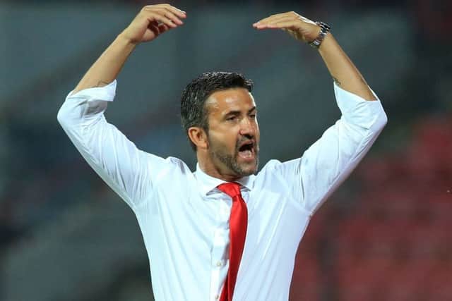 Albania's coach Christian Panucci celebrates. Pic: AP