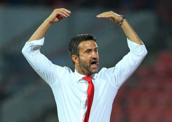 Albania's coach Christian Panucci celebrates. Pic: AP