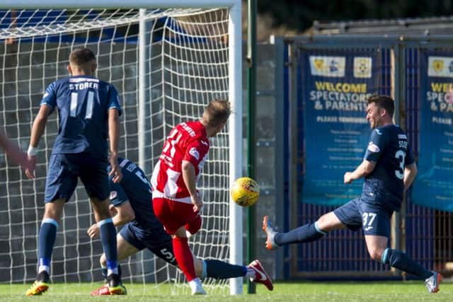 East Fife's Scott Agnew levels the scoring. Pic: SNS/Sammy Turner