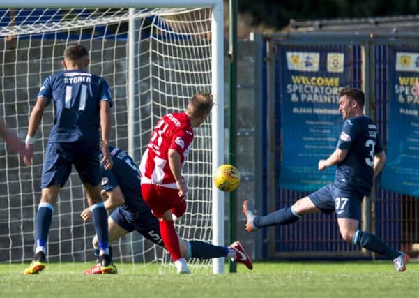 East Fife's Scott Agnew levels the scoring. Pic: SNS/Sammy Turner