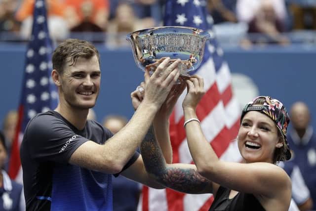 Jamie Murray and Bethanie Mattek-Sands hold the trophy after winning the mixed doubles final at the US Open. Picture: AP