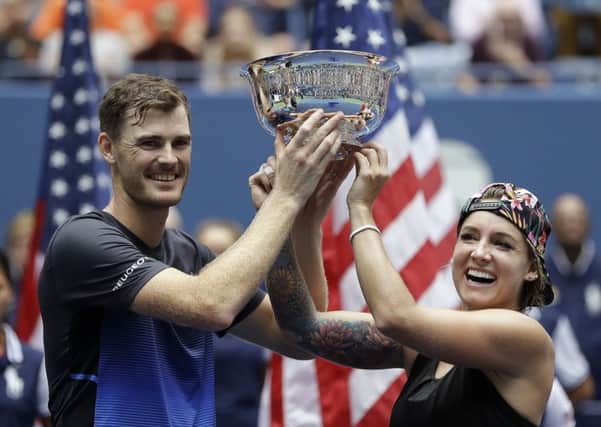 Jamie Murray and Bethanie Mattek-Sands hold the trophy after winning the mixed doubles final at the US Open. Picture: AP