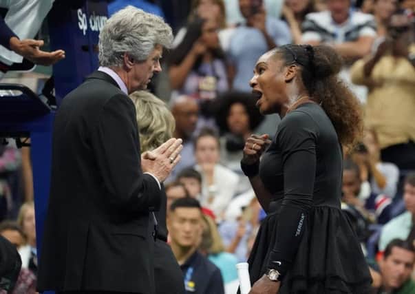 Serena Williams argues with referee Brian Earley during her US Open final defeat by Naomi Osaka of Japan. Picture: AFP/Getty Images