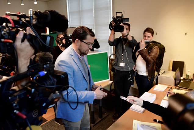 Jimmie Akesson, leader of the right-wing nationalist Sweden Democrats party, votes in the Swedish general election. Picture: Getty