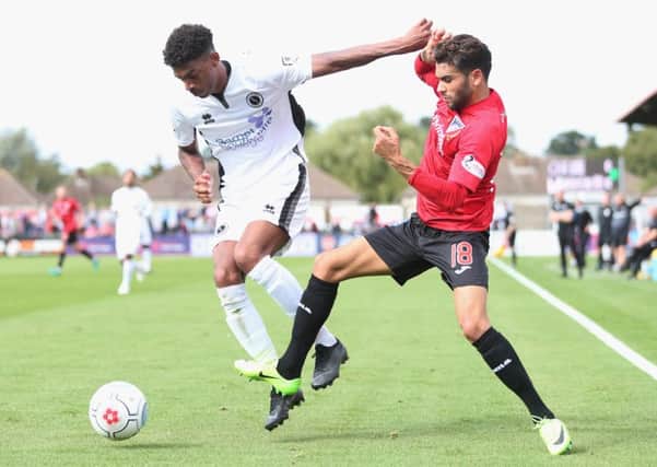 Reeco Hackett-Fairchild of Boreham Wood and Faissal El Bakhtaoui of Dunfermline  battle for possession at Meadow Park. Picture: Getty.