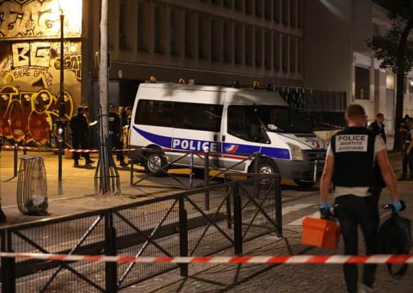 French police on the scene where seven people were attacked by an armed man in Paris. Picture: AFP