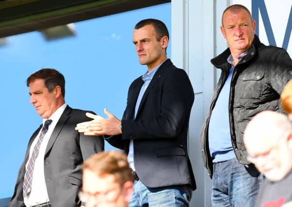 Oran Kearney (centre) watches St Mirren's Under-21s take on Hamilton Under-21s, with Chief Executive Tony Fitzpatrick (left) and Brian Rice (right). Picture: SNS Group