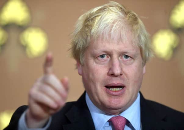 Boris Johnson has argued that the UK should follow Donald Trump's example and slash taxes to create a "happy and dynamic economy". Picture: PA Wire