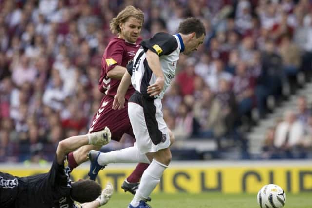 Robbie Neilson made a famous last-gasp tackle on David Graham as Hearts beat Gretna to win the Scottish Cup at Hampden in 2006