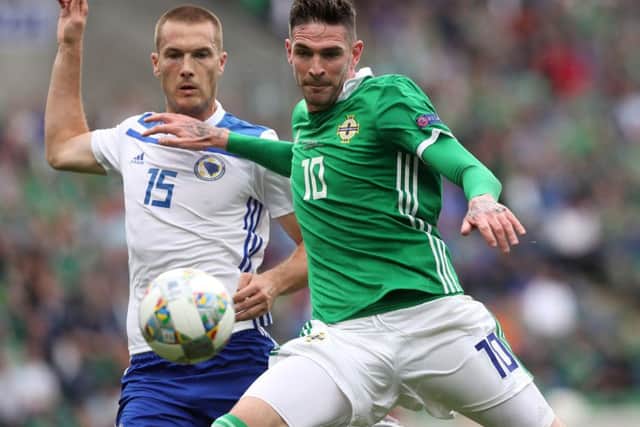 Kyle Lafferty in action for Northern Ireland against Bosnia & Herzegovina's Toni Sunjic. Picture: PA