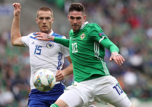 Kyle Lafferty in action for Northern Ireland against Bosnia & Herzegovina's Toni Sunjic. Picture: PA