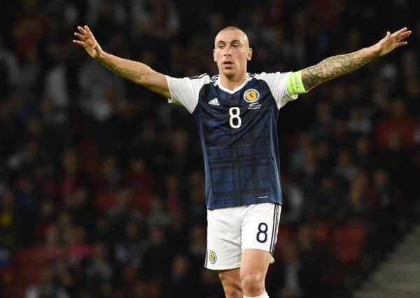 Scott Brown in action for Scotland at Hampden, which the Celtic player branded 'one of the worst stadiums for atmosphere'. Picture: SNS Group