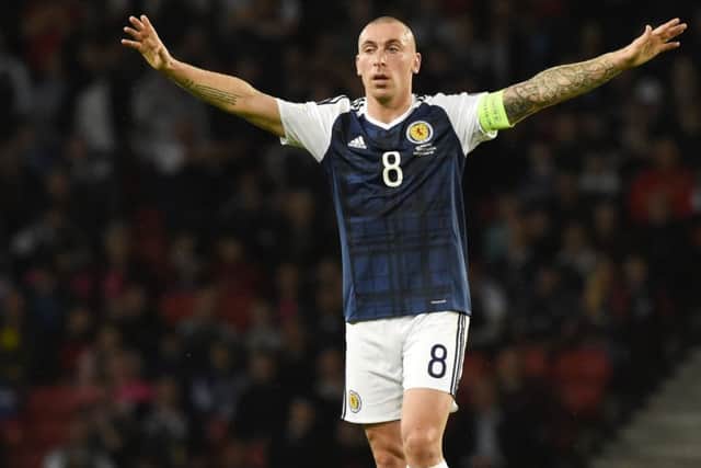Scott Brown in action for Scotland at Hampden, which the Celtic player branded 'one of the worst stadiums for atmosphere'. Picture: SNS Group